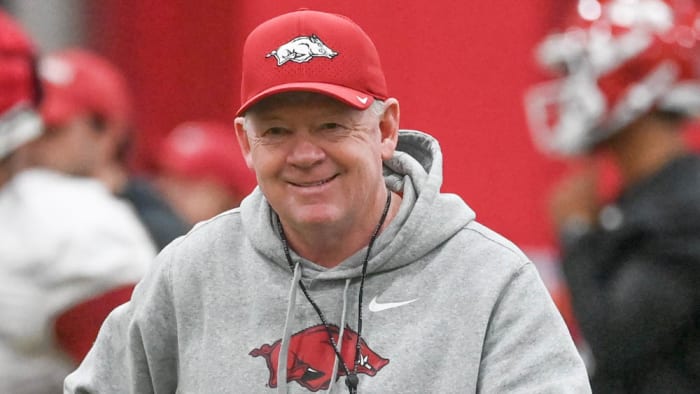 New Razorbacks offensive coordinator Bobby Petrino at practice Thursday